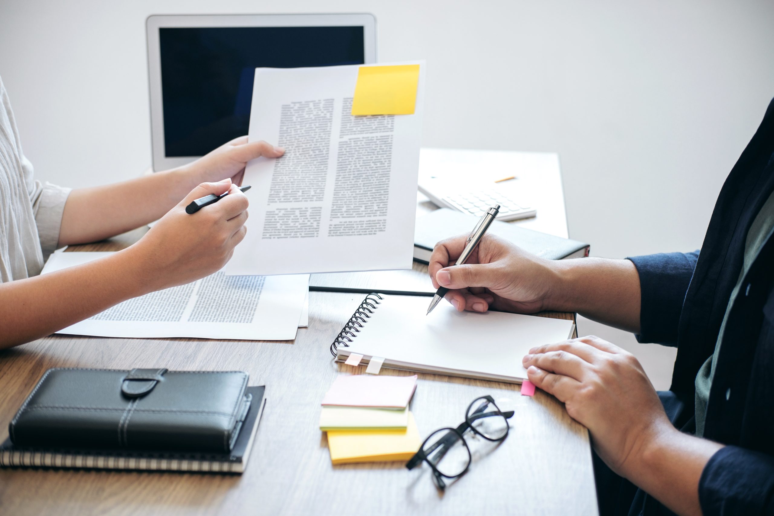 Two high school students campus or classmates with helps friend studying for a test an exam in workbook learning in classroom, Tutor books with friends, Education school concept.